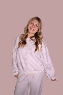 Light gray floral crewneck sweatshirt with crew neck and gathered cuffs