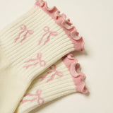 Pretty in Pink Bow Grip Sock for teen girls – Shop The Headliner